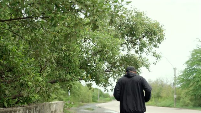 Happy active senior man jogging in nature after retirement. Healthy aging, fitness. Longevity outdoor lifestyle, preventive health, retirement happiness. Life insurance and financial security concept.