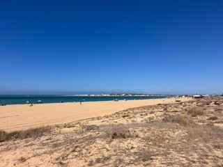 view from the Playa de Sancti Petri over the Cano de Sancti Petri to the dunes of Playa de Camposoto and the Castillo de Sancti-Petri island, vacation, Chiclana de la Frontera, Cadiz, Andalusia, Spain © keBu.Medien
