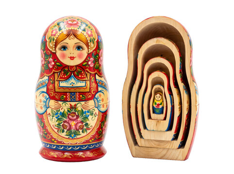Traditional russian matryoshka nesting doll set displayed with painted outer doll and nested wooden interiors, colorful folk art pattern and lacquered finish