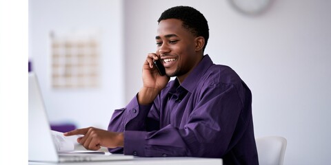 Obraz premium Young professional on mobile phone using laptop at home office for remote work banner and background