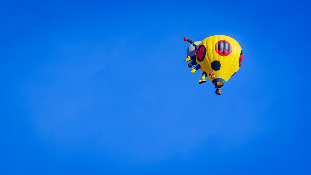 Funny hot air balloon rise high in the sky