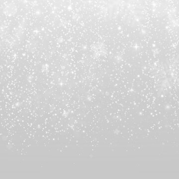 Sparkling snowfall with dense snow particles and bright winter highlights.