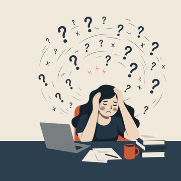 Woman experiencing stress and confusion while working at laptop