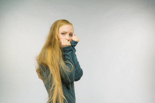 Sad girl with blowing hair