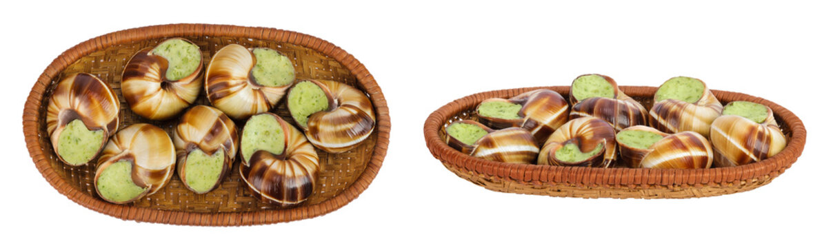 escargot snail filled with garlic and parsley butter in wicker basket isolated on white background. Top view. Flat lay
