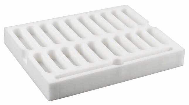 Rectangular white industrial foam packaging insert with multiple rounded slots isolated on a clean white background for shipping fragile items