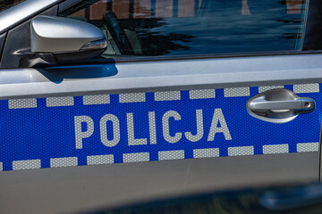 Polish Police Car at an Accident Scene – Road and Railway Accident Response © dominikspalek.pl