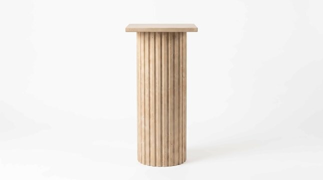 Beige fluted stone pedestal column stands isolated on a plain white background for showcasing luxury products and elegant artistic displays