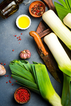 Fresh leeks, green vegetables, organic produce. Top view. healthy eating concept.