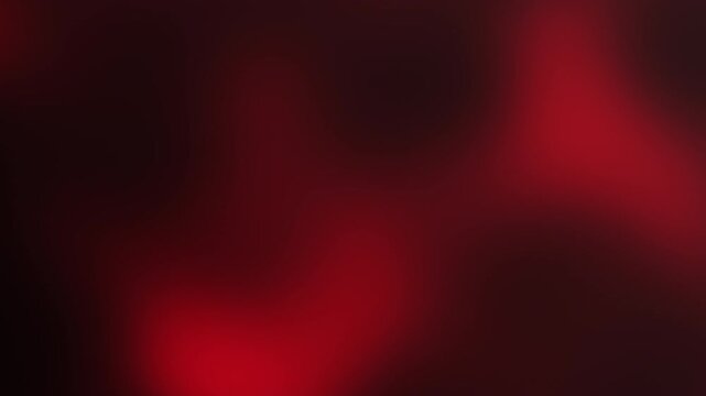 Dark red blurred gradient background with soft light, seamless loop for cinematic abstract visuals.