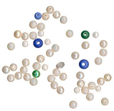 Scattered white pearl beads and colorful accent gemstones isolated on transparent background PNG for jewelry design craft projects and scrapbooking