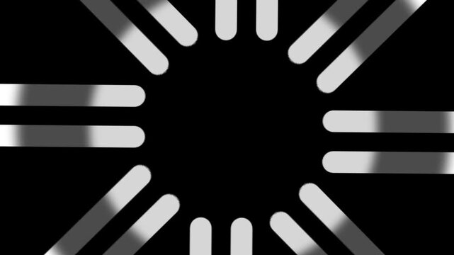 An abstract spinning wheel icon rendered as blurred silver streaks radiating outward in a circular motion is displayed on solid black background image