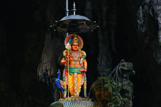 Kuala Lumpur, Malaysia, - January 24, 2023: Amazing Batu caves with hindu temple and lots of pilgrims and tourists