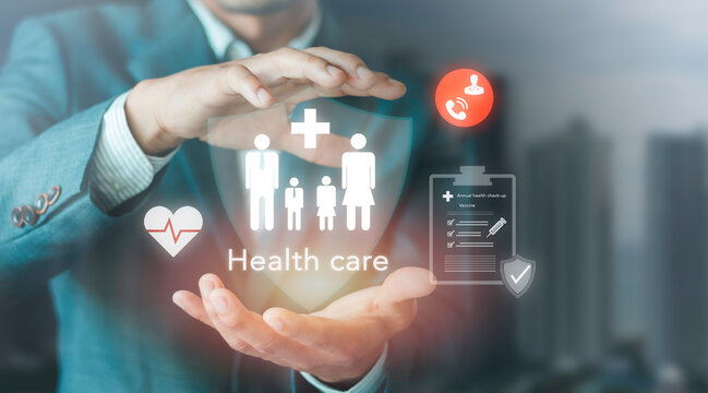 Businessman holding family health care protection concept on virtual screen. Annual medical check-up, vaccination, emergency call, insurance policy coverage, family welfare and life security.