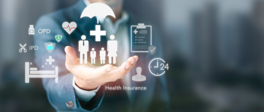 Businessman holding family health insurance icon concept. Medical protection, OPD IPD coverage, healthcare policy, emergency care, financial security, and risk management.