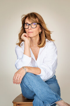 Portrait of confident businesswoman over white background