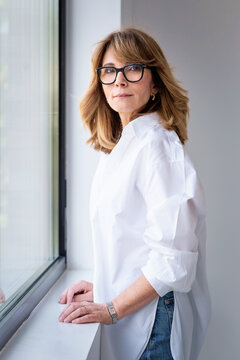 Portrait of a confident businesswoman over white background