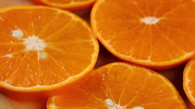 Fresh orange slices on wooden plate,The fruit is refreshing.