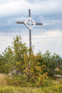 Summit Cross on Enzian Mountain with Scenic Landscape in the Bavarian Forest, Bavaria, Germany under Cloudy Summer Sky