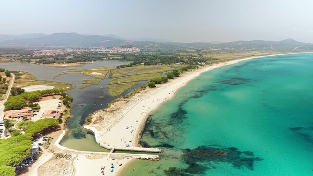 Aerial View of Turquoise Sea, White Sand Beach and River Mouth at Spiaggia di Posada, Sardinia, Italy