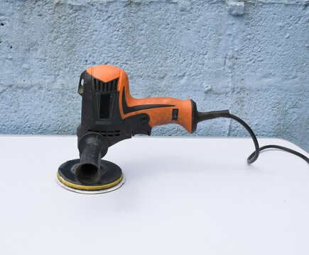 Orbital Sander on Wooden Surface &ndash; Power Tool for Woodworking and DIY
