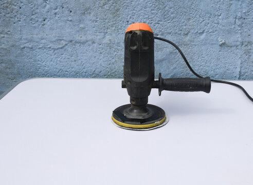Orbital Sander on Wooden Surface &ndash; Power Tool for Woodworking and DIY
