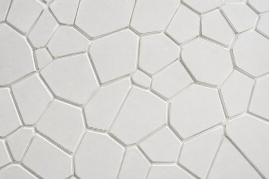 Voronoi cell relief pattern in matte white 3D render