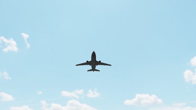 Commercial passenger airplane flying through the sky and taking off, ideal for aviation, air travel, tourism, transportation, airline, and travel content.