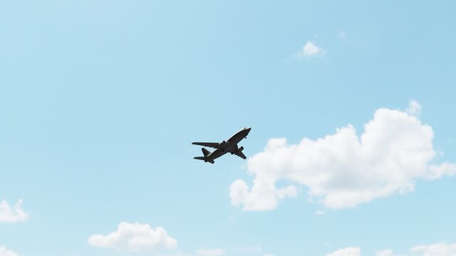 Commercial passenger airplane flying through the sky and taking off, ideal for aviation, air travel, tourism, transportation, airline, and travel content.