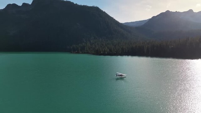Aerial Drone View of Seaplane on Lake with Sunshine Coast Mountains