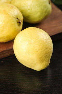 Fresh Yellow Guava Fruits on Wooden Board - Tropical Fruit Photography