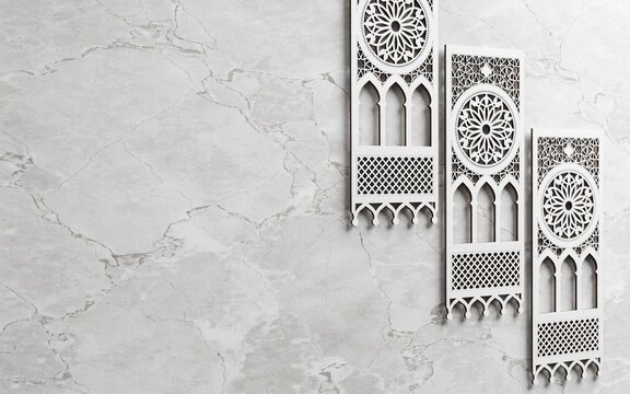 Three white ornate panels with islamic geometric patterns on marble wall