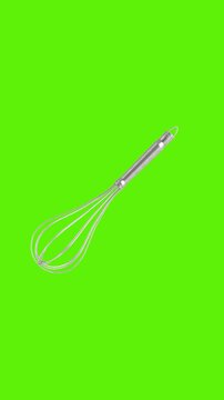4k Resolution Vertical Video for Social Media: Cooking, Baking, Food Preparation, Mixing And Kitchen Utensil Concept. Stainless Steel Balloon Whisk Seamless Loop Animated On Green Background 