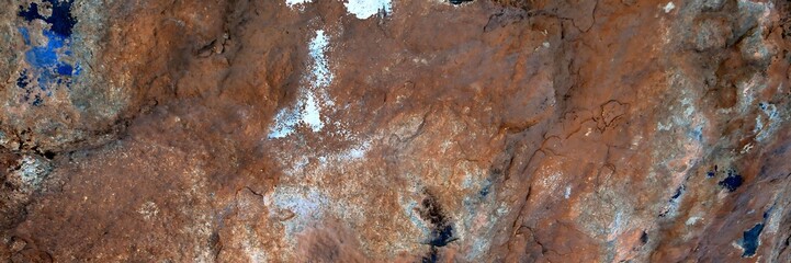 Red planet terrain with intricate patterns, an abstract landscape geology view © Harry