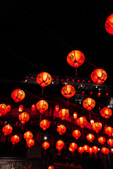 Fototapeta premium Jiufen old town with glowing red lanterns at night, Taiwan