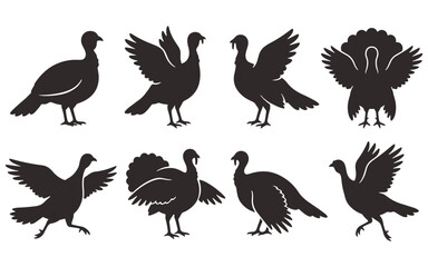 Obraz premium A collection of black turkey silhouettes in various poses including standing walking and displaying feathers for thanksgiving holiday designs