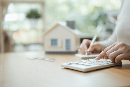 real estate mortgage with savings asset; a property planning desk scene. real guides choices, estate frames meaning, and mortgage supports buyers. Clear visual context supports stock buyers.