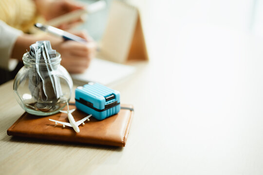travel savings vacation with fund airplane; a travel planning scene. travel guides choices, savings frames meaning, and vacation supports buyers. Clear visual context supports stock buyers.