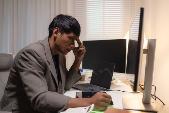 Professional financial analyst reviewing stock market charts across multiple screens using a tablet, laptop and calculator to evaluate price movements, technical indicators, and investment strategies.