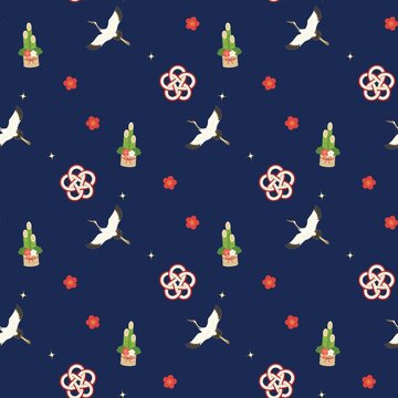 Japanese New Year seamless pattern with flying crane, kadomatsu, mizuhiki knot and plum blossoms on deep navy blue background