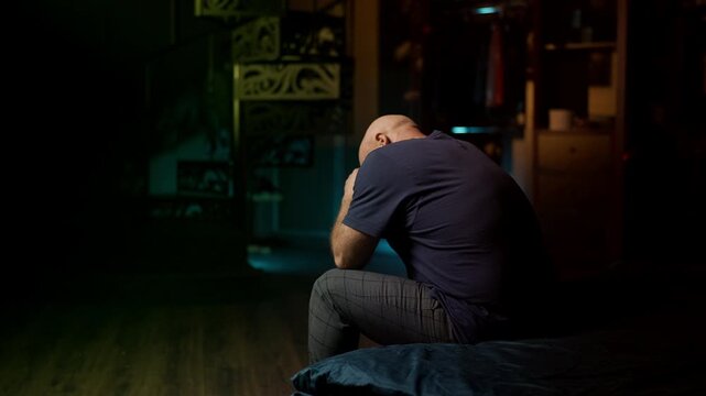 Melancholic man in his 50s struggles with emotional stress at home and burnout