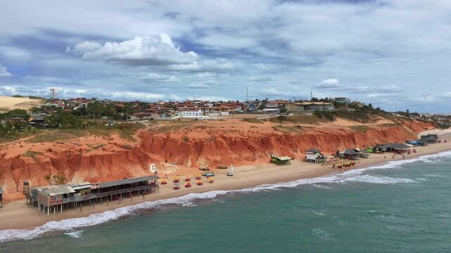 Aerial View of Beach Town with Red Sandstone Cliffs, Northeast Brazil