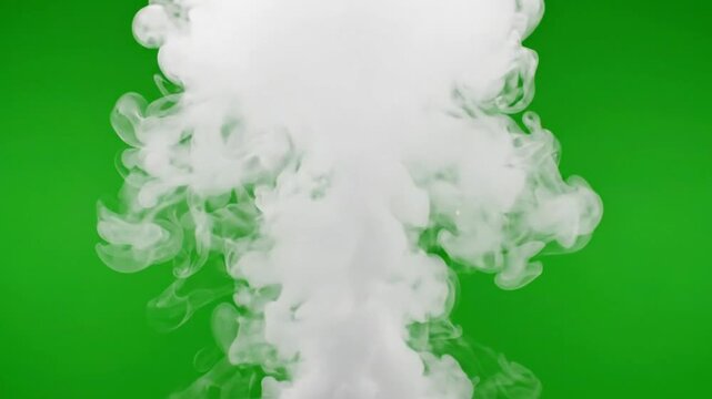White Smoke and Fog Rising on Green Screen, Large soft smoke cloud swirling and floating isolated on green screen background chroma key effect overlay whitet
