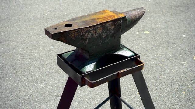 
An old blacksmith anvil. Vintage equipment used for metal forging. Traditional metalworking tool.