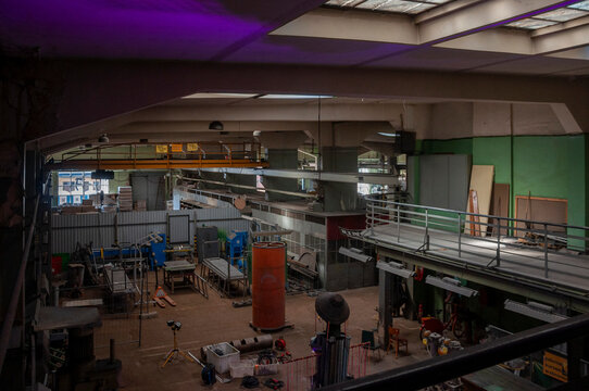 Abandoned old industrial textile research institute with laboratory chemistry glass, machinery workshop and factory hall