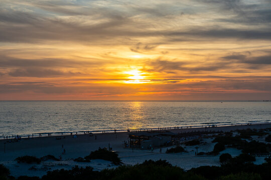 sunset on La Barrosa beach in Sancti Petri, Cadiz, Spain