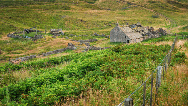 Wolf Cleugh are derelict miners cottages at Rookhope, in the North Pennines a National Landscape of sweeping  moorlands, renowned for vast open skies, winding rivers and historic stone buildings
