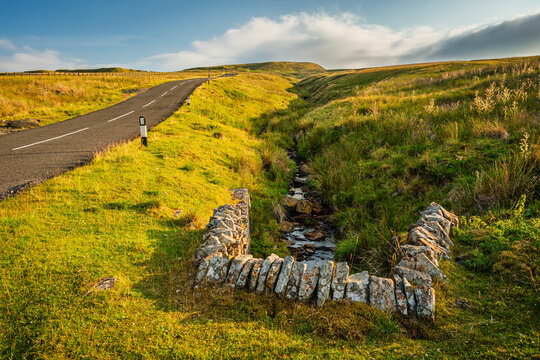 Birk Sike stream on Harthorpe Moor in the North Pennines, a landscape of sweeping  moorlands, renowned for vast open skies, winding rivers and historic stone buildings in a National Landscape