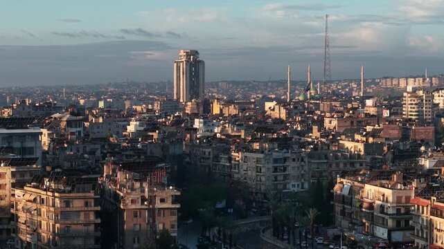 Scenic aerial drone view of an Islamic mosque at sunrise. Urban landscape during the holy month of Ramadan and Eid