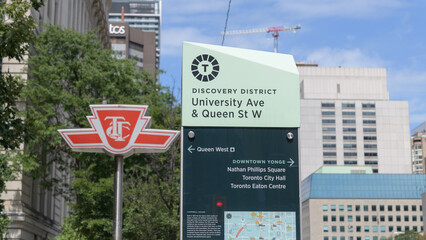 Fototapeta premium wayfinding sign in the Discovery District (University Ave & Queen St W) outside Osgoode Line 1 subway station, Toronto